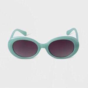 A new day oval light blue sunglasses. Super stylish for spring and summer